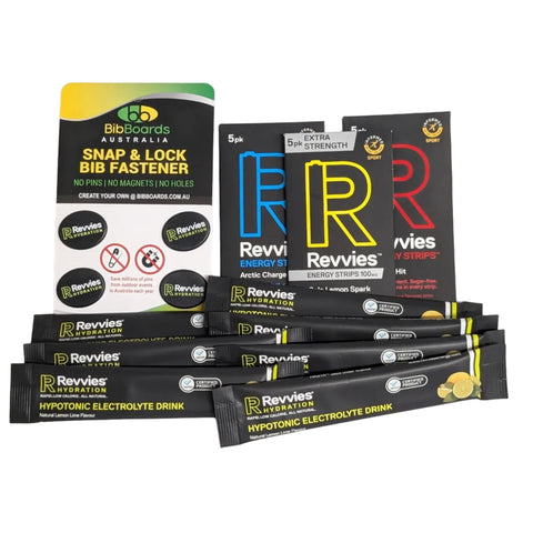Revvies Hypotonic Electrolyte Drink Single serves, and a BibBoards Australia Snap & Lock Big Fastener accessory,  and Revvies Enery Strips arranged on a white background.